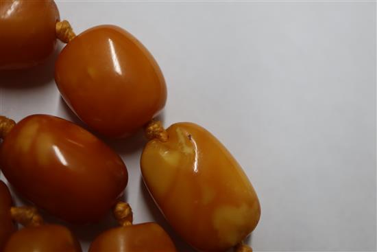 A single strand amber bead necklace, gross weight 48 grams, 57cm.